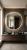 Backlit_round_mirror_in_bathroom_2K_20261021093950.jpg